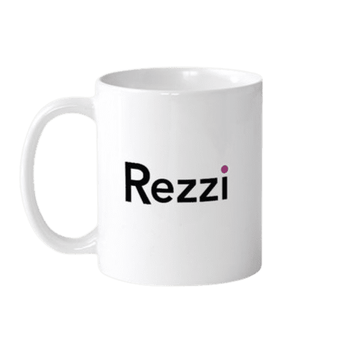 White mug with the word 'Rezzi' printed in black. get in the rezzi zone #runwithrezzi #rowwithrezzi #ruckwithrezzi #ridewithrezzi